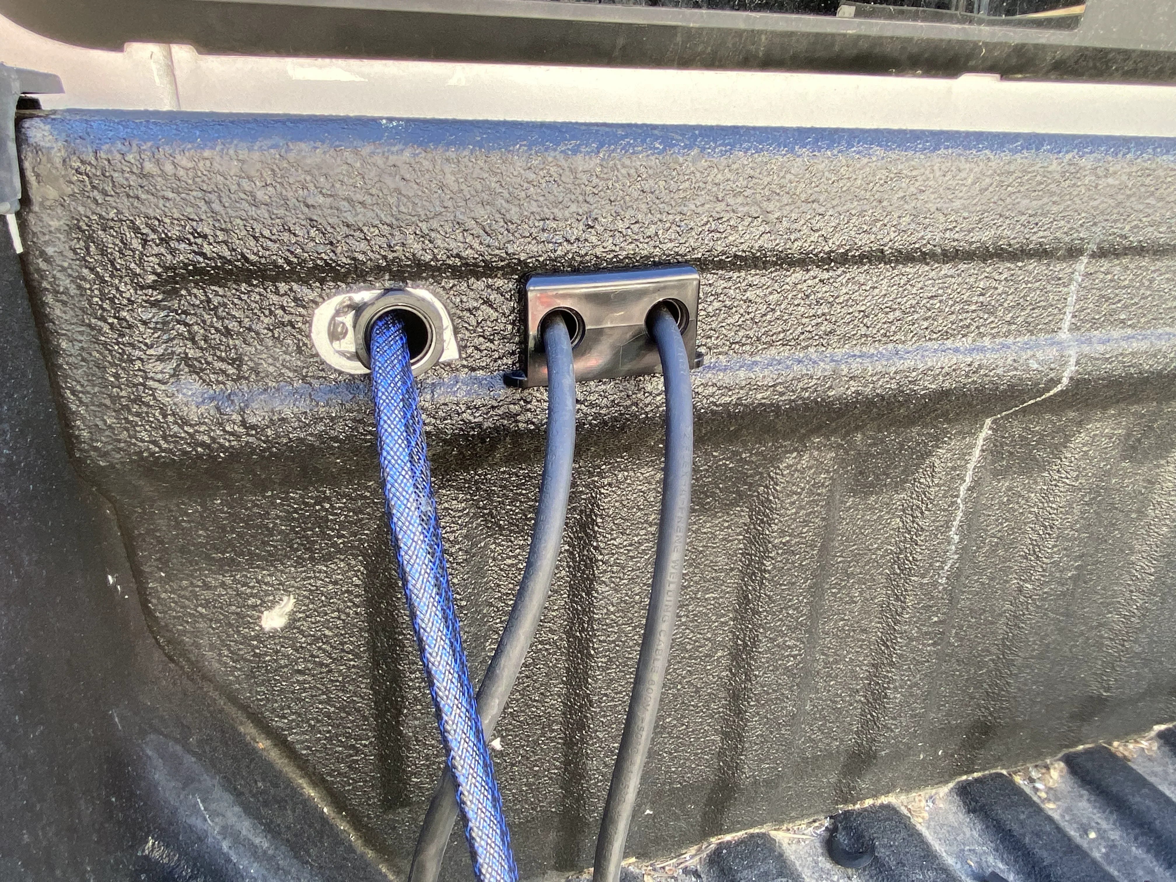 Waterproof pass-through grommets installed in bulkhead